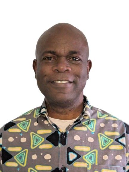 Raphael Adegboye in an African print shirt